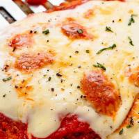 Chicken Parmigiana · Breaded breast of chicken, fresh tomato sauce, topped with mozzarella cheese. Choice of past...