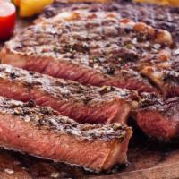 Black Angus Ribeye Steak · 16 oz. cut certified Black Angus, mesquite grilled to order. Choice of pasta (spaghetti) or ...
