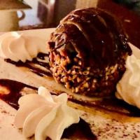 Peanut Butter Bomb · Chocolate mousse, peanut butter & chocolate ganache, peanuts, chocolate peanut crust. Gluten...