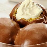 Profiteroles · Chantilly cream filled pastry puffs, hazelnut chocolate mousse & house-made vanilla gelato.