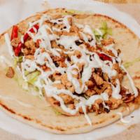 Chicken Gyro · Cooked on a spit and wrapped in a pita.