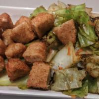 Tenders With Stir Fry Cabbage · Soul Food Inspired Stir Fried Cabbage Mixed With Carrots And Seasoned. Also Topped With Chik...