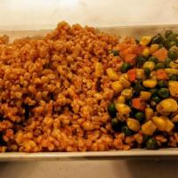 Khadijah Wheat · Bulgur Wheat Mixed In Rich Tomato And Red Pepper Base Sauce With Onions And Spices. Added Mi...