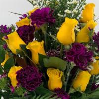 One Dozen Roses Plus · One dozen roses with bonus in season flowers to complement the color. Please add any specifi...