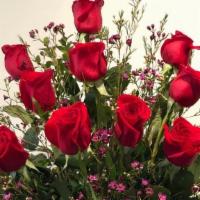 One Dozen Roses · Please add any specific color preferences in the notes at checkout.