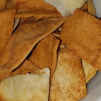 Pita Chips · Pita chips toasted and seasoned with our special fresh spices. Great for dipping with Hummus...