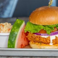 Fried Chicken Sandwich · Breaded fried chicken thigh served with lettuce, tomato, onion, Pimento Cheese and Ranch on ...