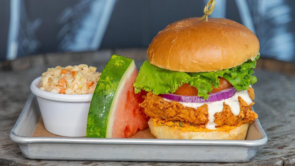Fried Chicken Sandwich · Breaded fried chicken thigh served with lettuce, tomato, onion, Pimento Cheese and Ranch on a  potato bun. Allergy -Dairy, Egg, Gluten, Soy.