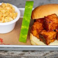 Pork Belly Burnt Ends Sandwich · Our delicious smoky, sweet Pork Belly ready to melt in your mouth, piled on a potato bun.