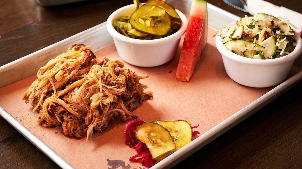 Pulled Pork Plate · includes two sides and one sweet BBQ sauce