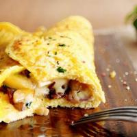 Omelet Brie · Brie Cheese, Bacon, Caramelized onion.