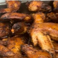 Smoked Wings  · Smoked turkey Wings lightly seasoned and cooked to perfection and your 1st side is free!