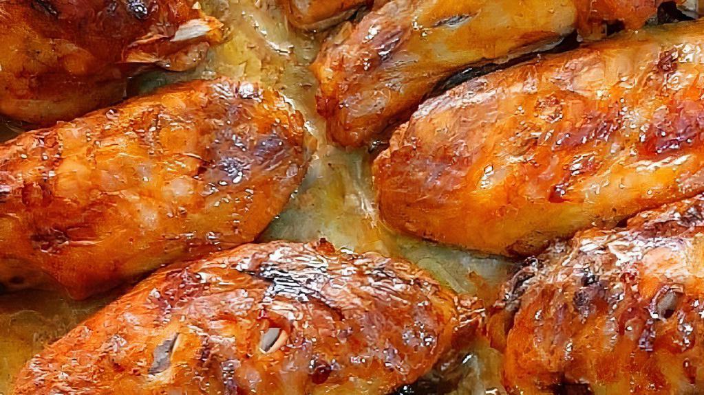 کتف و بال کبابی / Chicken Wings · Chicken wings marinated in onion lemon, saffron.