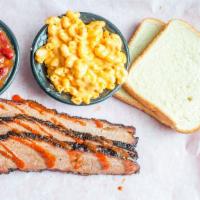 Beef Brisket Platter · Includes 2 Choice Sides and white bread.