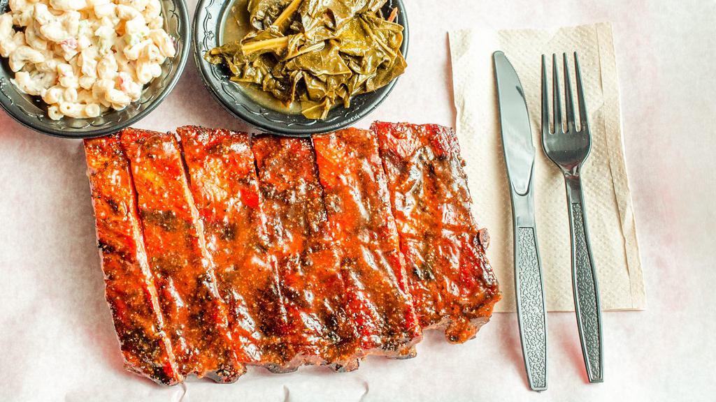 1/2 Slab Rib Platter · Includes 2 sides and white bread.