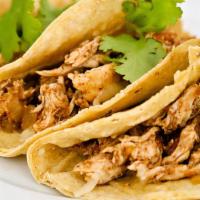 Pollo / Chicken (Tacos) · Tortilla topped and folded with a filling of thick chunk chicken, red onion, cilantro.