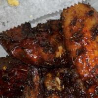 B-Que Jerk Wings · The perfect combination of sweet and spicy.