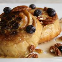 Sticky Cinnamon Bun French Toast · Sliced sticky cinnamon bun dipped in our homemade french toast batter and cooked to perfecti...