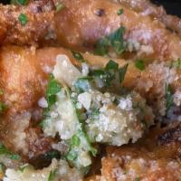Mothan Wings · Dracula's enemy with these roasted garlic-parmesan wings....these are truly a garlic lovers ...