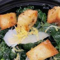 Tuscan Kale & Arugula Salad · Crisp kale, shaved parmesan, and garlic-herb croutons tossed in a lemon-shallot vinaigrette.