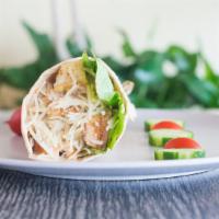 Chicken Caesar Wrap · Grilled chicken, romaine lettuce, and Tuscan Caesar dressing in a honey wheat wrap.