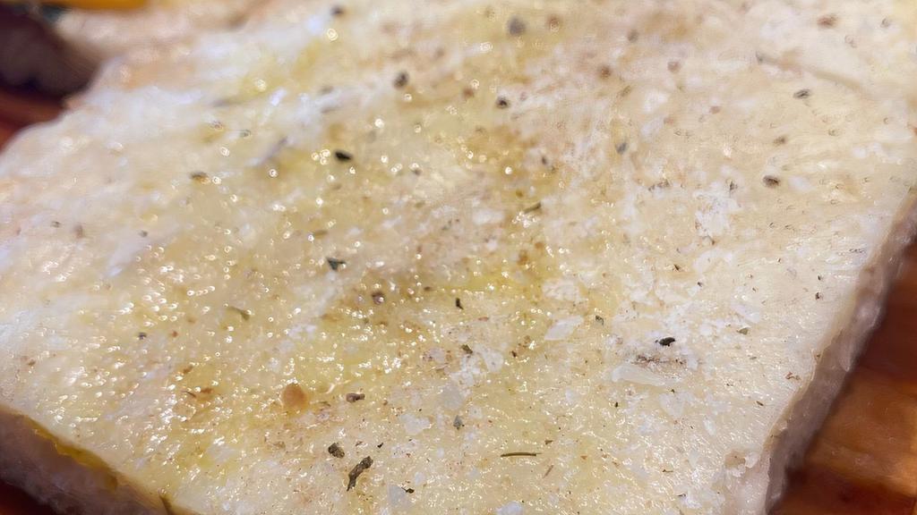 Ivory Pizza (Rize Crust) · Fontina, fresh mozzarella, Asiago, truffle oil, roasted garlic, cracked black pepper, and sea salt. 8 slices of Rize crust square thicker crust.