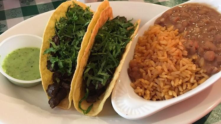 Steak Taco Plate · Served with rice and beans or salad, choice of hard shell tortilla on the outside with a soft corn tortilla on the inside or 2 lightly toasted soft corn tortillas. Choice of Mexican style cilantro and onions or lime.