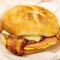 Big Start · Double egg, cheese sausage, ham and bacon wrap or roll. Denotes food items cooked to order o...