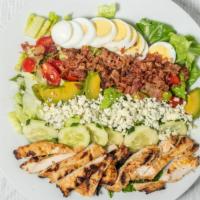Cobb Salad · Romaine with grilled chicken, avocado, Gorgonzola crumbles, bacon, cucumber, tomato, and har...