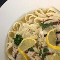 Chicken Piccata · Capers, Mushrooms and Garlic in a Lemon White Wine Sauce.