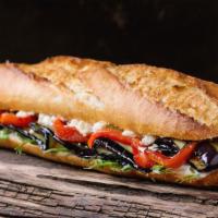 Eggplant Parm Sandwich · Hot, wonderful eggplant sandwich with tomato sauce and fresh mozzarella.