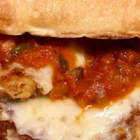 Chris'S Chicken Parm · Chicken breast pounded out and lightly breaded with secret spices and flour, pan fried, topp...