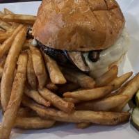 Mushroom Swiss Burger · 8oz. Handmade burger topped with grilled mushrooms and melted swiss cheese. All burgers and ...