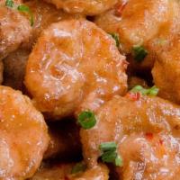 Sweet And Tangy Shrimp · (8) lightly battered fried shrimp tossed in our homemade 'bang bang sweet chili sauce.