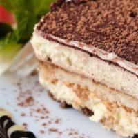 Tiramisu (Our #1 Selling Dolci On Dd) · Layers of espresso drenched sponge cake and mascarpone cheese dusted with cocoa powder