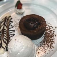 Lava Cake · Warm chocolate cake, vanilla and chocolate sauce
