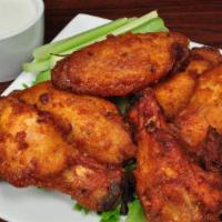 Wings · Floured, naked or boneless served with bleu cheese dressing and celery. Bone-in wings, choic...
