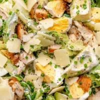 Caesar Salad · Romaine, shredded parmesan, creamy Caesar dressing, garlic crouton.
