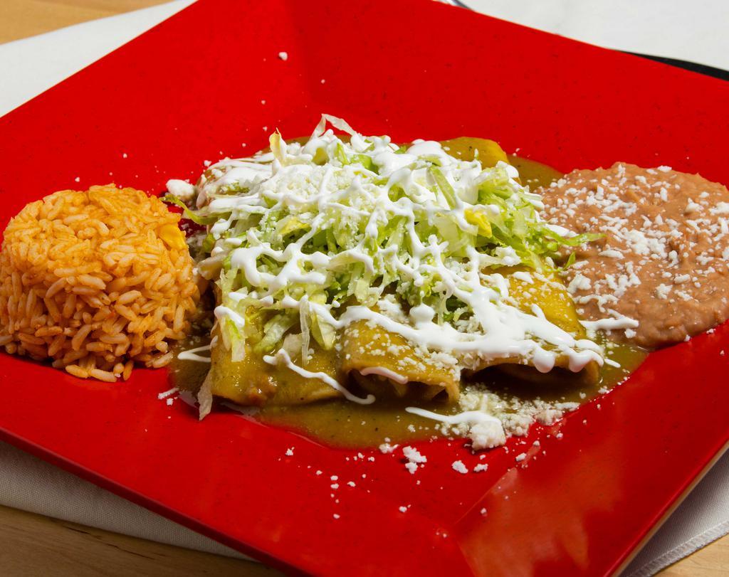 Enchiladas Verdes · Choice of steak, chicken or cheese topped with green chile sauce, lettuce, sour cream, queso fresco.
