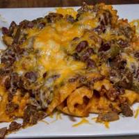Chili Cheese Fries · Waffle fries s smothered with homemade chili, melted cheddar jack, jalapeños & bacon.