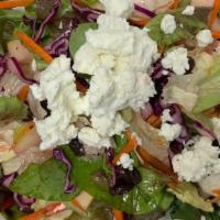 Honey Walnut Salad · Fresh spring mix salad tossed with tomatoes, walnuts, raisins and goat cheese sprinkled with...