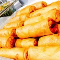 Veggie Spring Rolls · Fried spring rolls with mixed vegetables and glass noodles served with sweet and sour sauce.