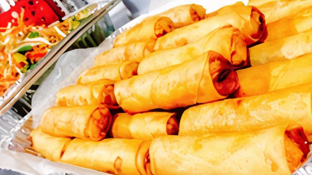 Veggie Spring Rolls · Fried spring rolls with mixed vegetables and glass noodles served with sweet and sour sauce.