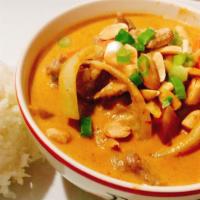Massaman Curry* · Mild. A choice of chicken , beef or shrimp served in hearty massaman curry paste, peanut sau...