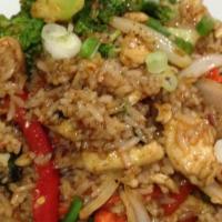 Basil Fried Rice** · Medium. Thai spicy fried rice with carrots, onions, green beans, bell peppers and fresh basi...