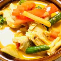 Red Curry** · Medium. A choice of chicken , beef or shrimp served in a hot and spicy red curry paste with ...