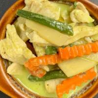 Green Curry*** · Hot. A choice of chicken ,beef or shrimp served in a hot and spicy green curry paste with co...