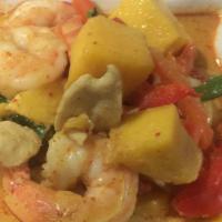 Mango Curry ** · Medium. Fresh mango with shrimp and chicken along with broccoli, green beans, fresh basil, b...