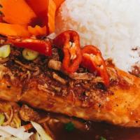 Tamarind Salmon* · Mild. Perfectly grilled salmon with a mild tamarind sauce topped with fried onion, Served wi...