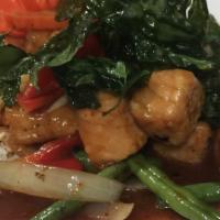 Basil Salmon** · Medium. Crispy fillet salmon stir- fried with onions, bell peppers, green beans, carrot, fre...